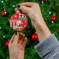 Red ceramic circular Christmas ornament with bear and argyle plaid, Slovak shield, held on gold string