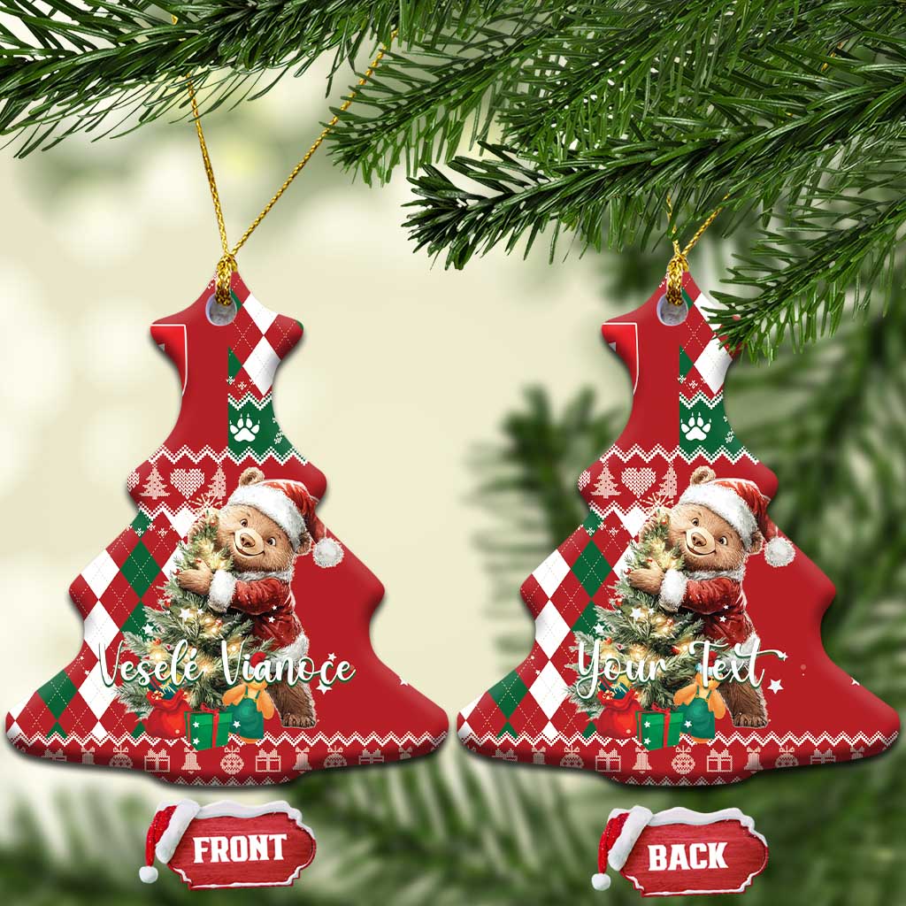Red ceramic Christmas tree-shaped ornament with bear, argyle plaid, Slovak shield, gold hanging loop