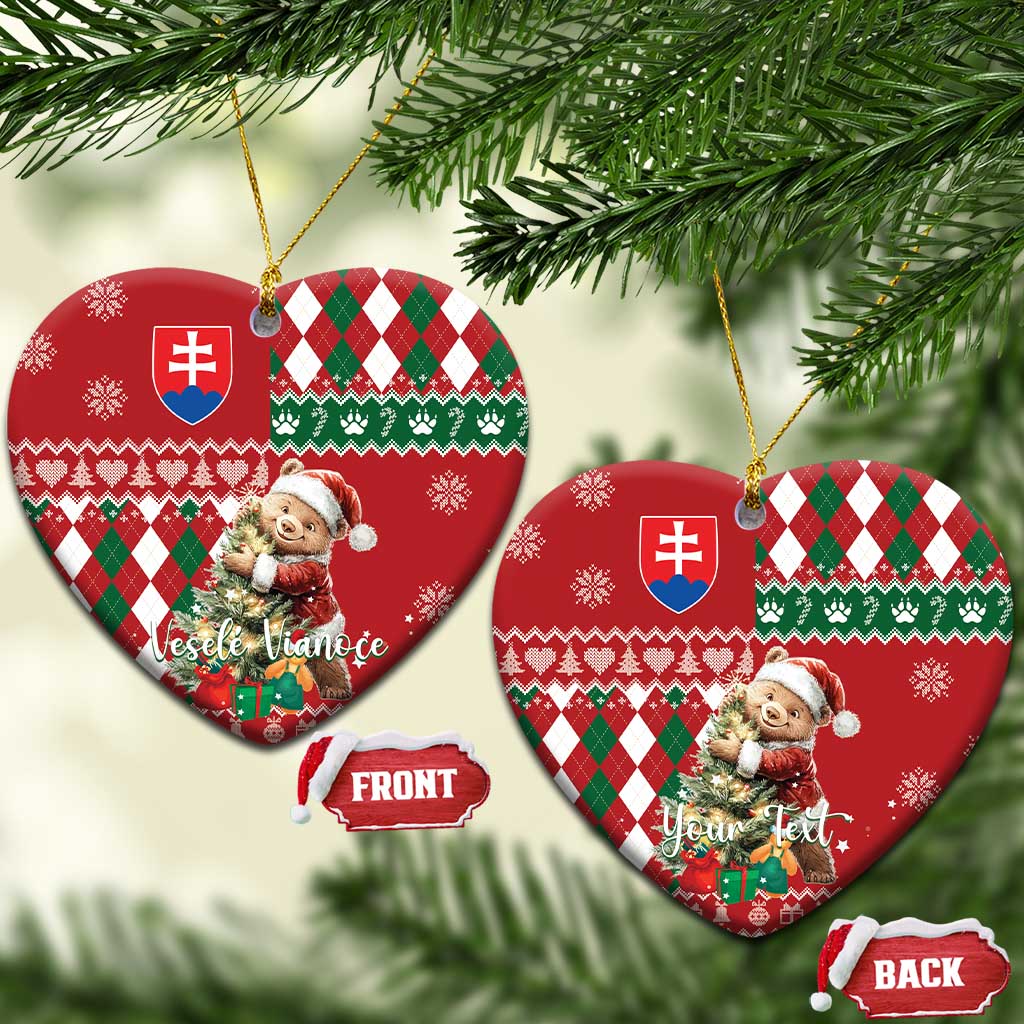 Red ceramic heart-shaped Christmas ornament with bear, argyle plaid pattern, Slovak shield, gold loop