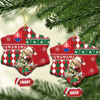 Red ceramic Christmas tree-shaped ornament with bear, argyle plaid pattern, Slovak shield, gold loop
