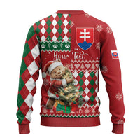 Back of red ugly Christmas sweater with bear, argyle diamonds, and crest emblem.