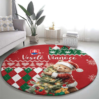 Round red Christmas rug with bear in Santa hat, argyle pattern and holiday text