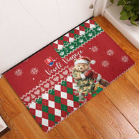 Red rubber Christmas doormat with bear, green-red check and zigzag diamond pattern