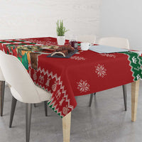 Red Christmas tablecloth with white and green pattern, icons and snowflakes