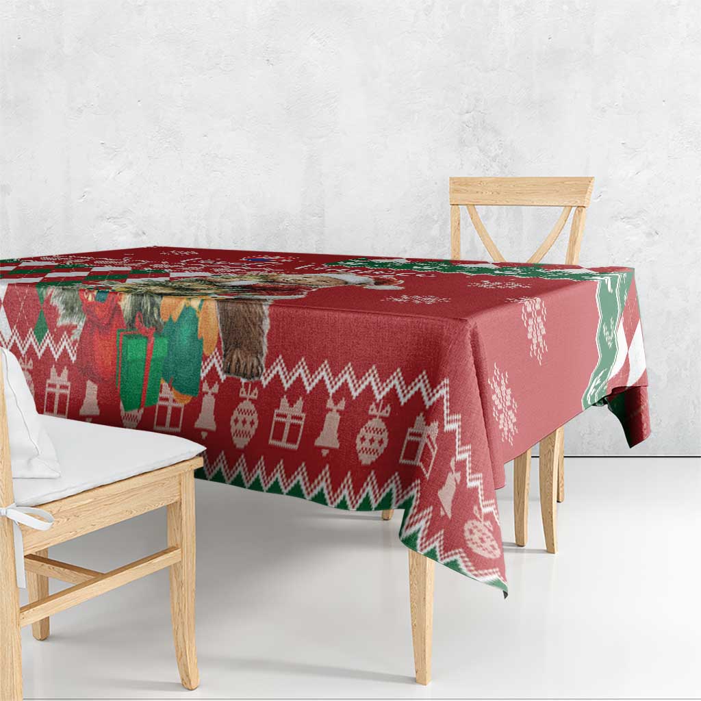 Red tablecloth with geometric argyle, reindeer and snowflake print