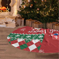 Red round Christmas tree skirt with green check panel, bear print and fringed trim