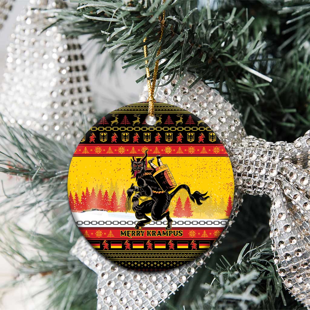 Yellow round ceramic Christmas ornament with Krampus artwork, hanging on a gold string.