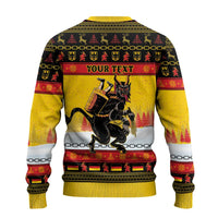 Yellow ugly Christmas sweater back view with 'Your Text' banner and Krampus chains graphic