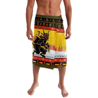 Yellow lavalava sarong with festive border, Krampus graphic and 'YOUR TEXT' panel