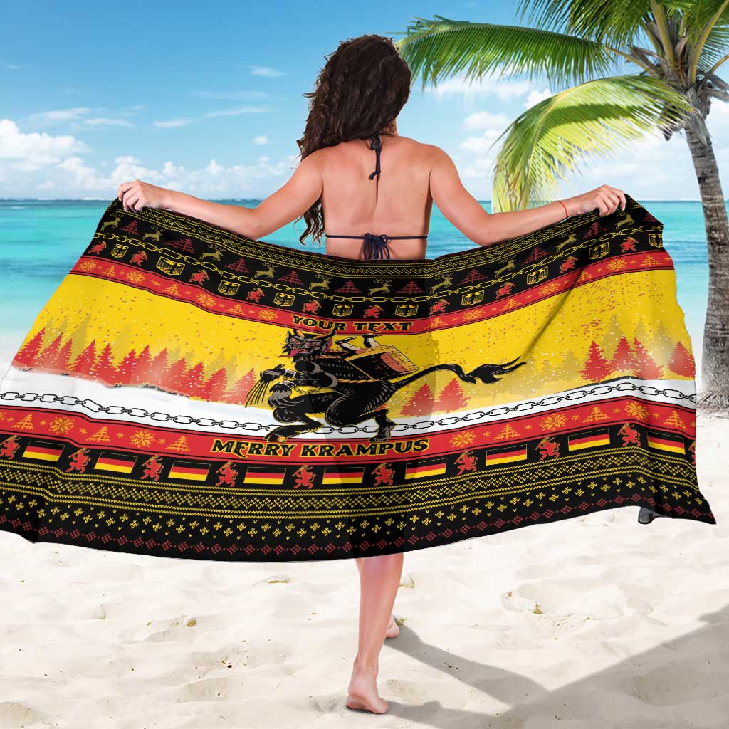 Yellow holiday wrap sarong with Krampus artwork and 'MERRY KRAMPUS' text