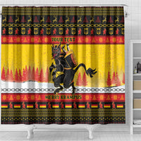 Yellow Christmas shower curtain with Krampus artwork and pine tree pattern border