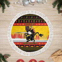 Round yellow tree skirt with white fringe edge, Krampus figure with “Merry Krampus”.