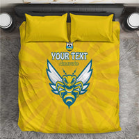 Yellow football-themed bedding set with custom text and crest on duvet and matching pillowcases