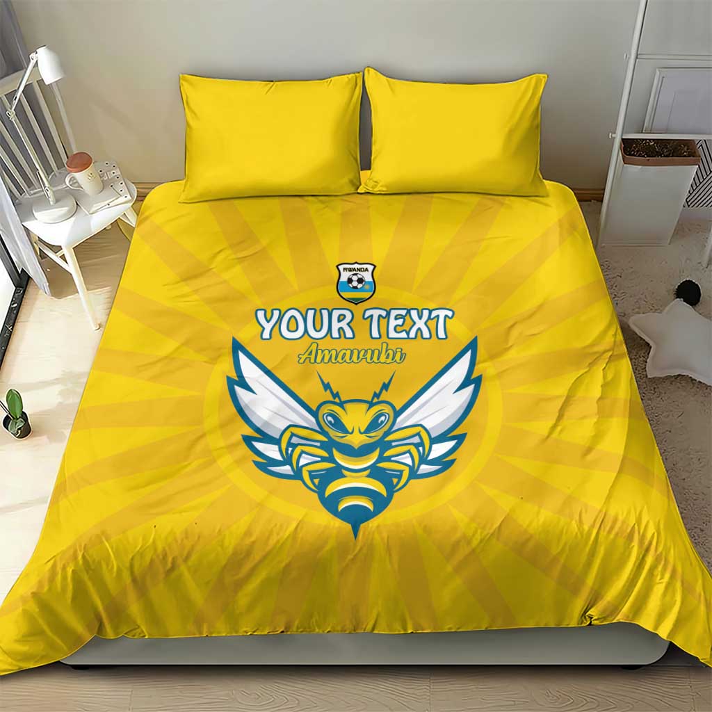 Yellow bedding set with YOUR TEXT and blue Amavubi-style emblem on duvet and two pillowcases