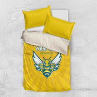 Yellow and white football bedding set with blue crest on duvet and two yellow pillowcases