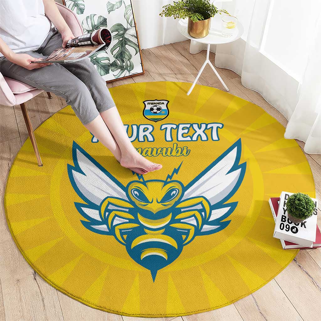 Yellow round rug with blue eagle crest, 'YOUR TEXT' and Amavubi