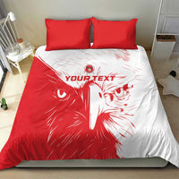 Red and white comforter set with lion artwork and two red pillow shams