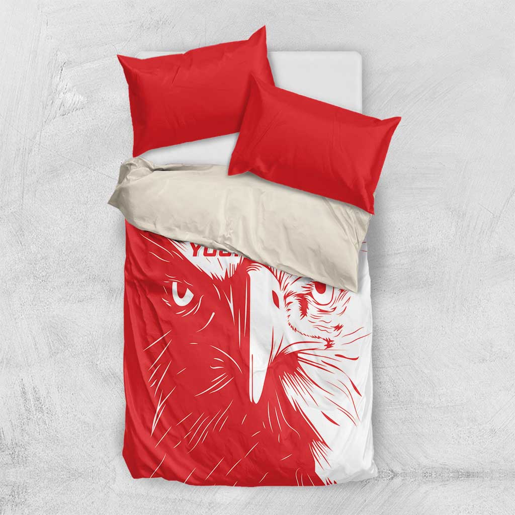 Red and white bedding set featuring a lion face print and two red pillowcases