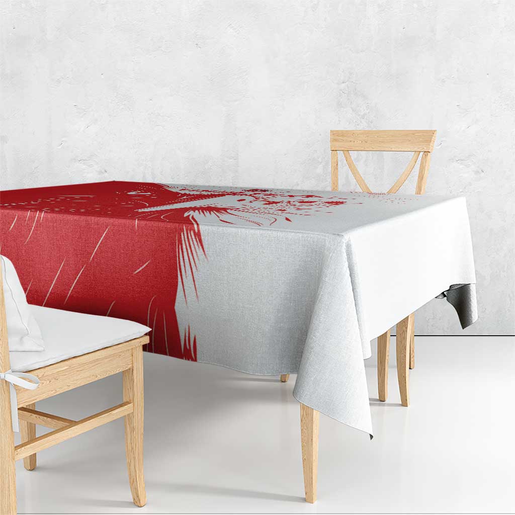 Red and white custom football tablecloth on rectangular table with draped corners
