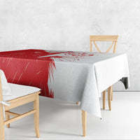 Red and white custom football tablecloth on rectangular table with draped corners