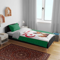 Green bedding set with two pillows and white duvet panel featuring fox and Algeria emblem