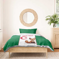 Green bedding set with duvet panel showing fox and red Algeria flag star