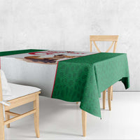 Green football tablecloth with patterned fabric and a side-draped border over bench seating