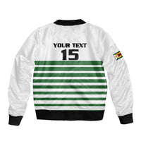 White bomber jacket back print: YOUR TEXT 15, green striped band, black ribbed hem, flag patch