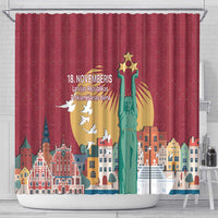 Red shower curtain featuring Freedom Monument, birds, and city buildings scene