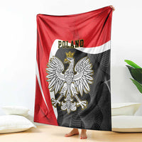 Red and black blanket with white stripe, crowned eagle emblem, and Poland text