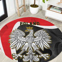Round red carpet with crowned eagle emblem, “Poland” at top and white border stripe