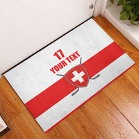 White and red striped rubber doormat featuring a Swiss cross shield and 'YOUR TEXT' with 17