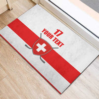 Rectangular rubber doormat with white field, red stripe, Swiss cross shield, and 'YOUR TEXT' 17