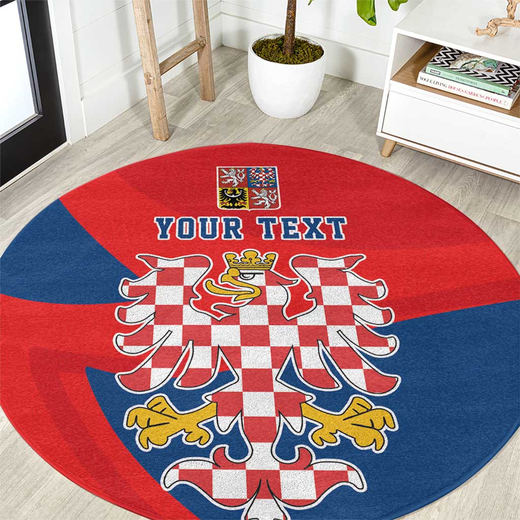 Red and blue round carpet showing crest and 'YOUR TEXT' across the center