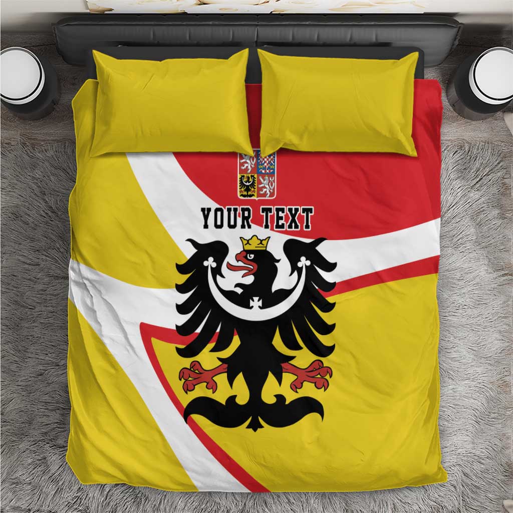Yellow bedding set with red and white diagonal stripe, black eagle crest, two pillowcases