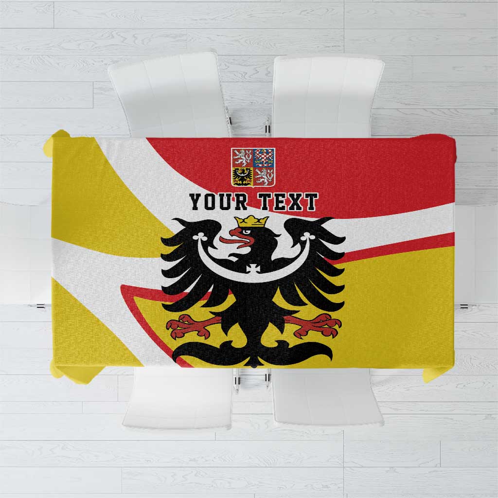 Yellow tablecloth with red/white stripes, black eagle crest, includes 'YOUR TEXT'