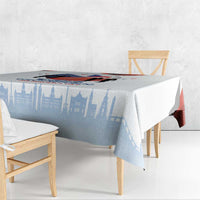 Light blue and white tablecloth with Czech skyline print and red-white flag panel.