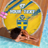 Yellow round beach blanket with blue "YOUR TEXT" print and white tassel fringe border.