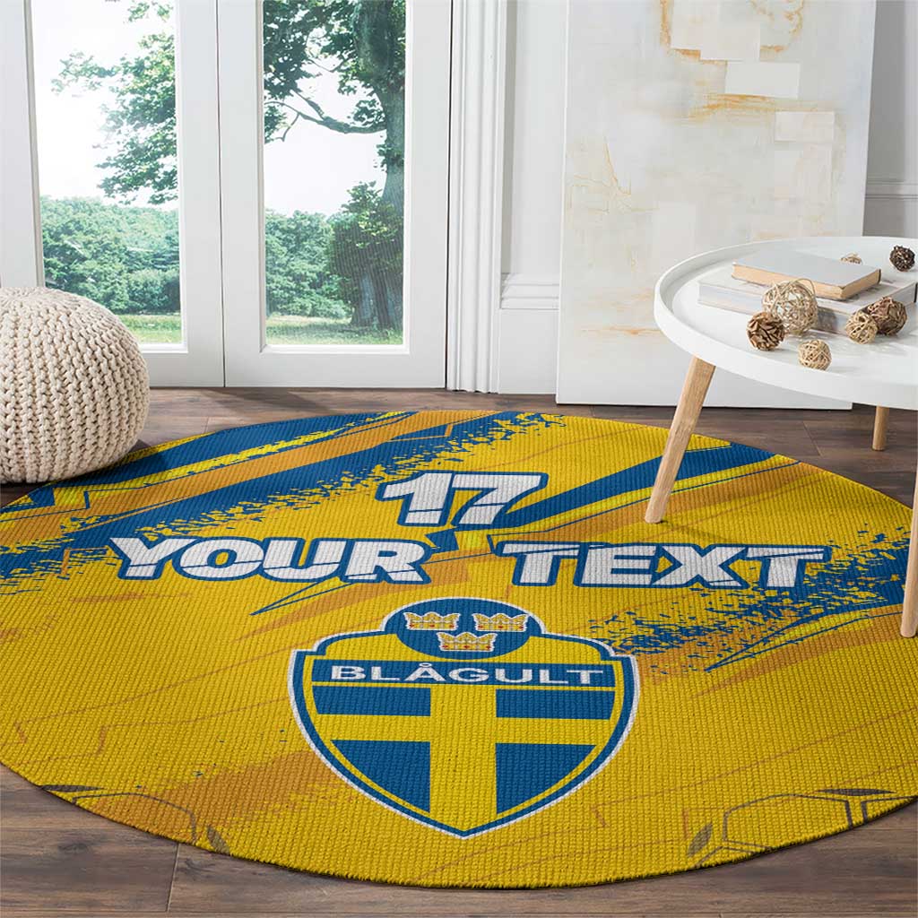 Round sport carpet with yellow base and blue 17 Your Text over crest emblem
