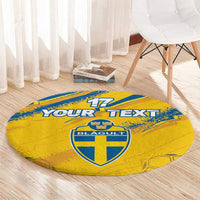 Round yellow-and-blue sport carpet with crest emblem, 17 and Your Text on floor