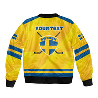 Yellow ice hockey zip bomber jacket, back crest graphic, blue sleeve stripes, ribbed hem