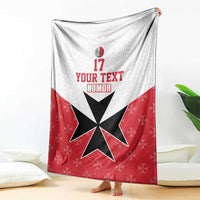 Football blanket draped with red lower section, white upper section, black star and 'YOUR TEXT'.