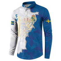 Blue and white polo sweatshirt with Sweden map graphic, crest, and Swedish flag sleeve patches