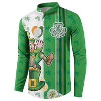 Green and white button sweatshirt with leprechaun art, clovers, and black vertical stripes.