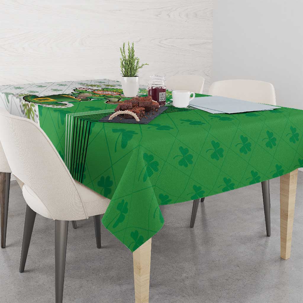 Green clover-themed tablecloth with stripe accents and leprechaun centerpiece