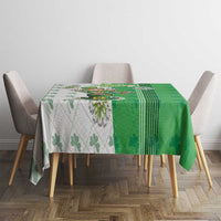 Green tablecloth with leprechaun, clover border, and vertical stripe panel
