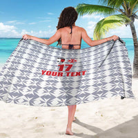 Back view custom sarong wrap in white and gray geometric pattern with red logo, number 11 text