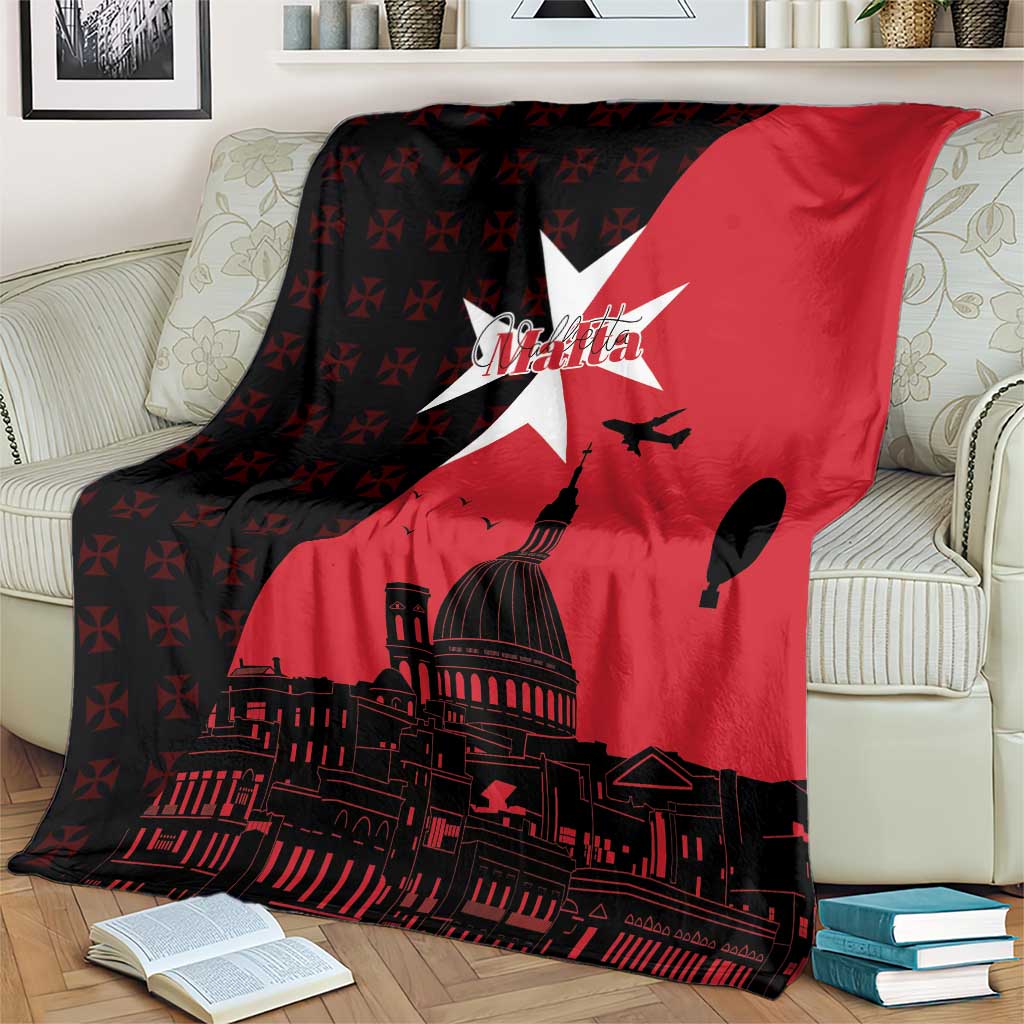 Red and black throw blanket with bold white star and Malta skyline artwork