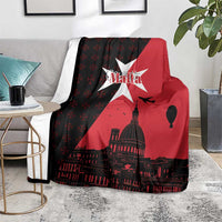 Red and black throw blanket with white star, dome skyline, and balloon silhouette