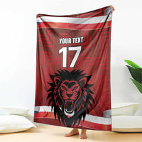 Red custom football blanket hanging, lion face, 'YOUR TEXT' and number 17